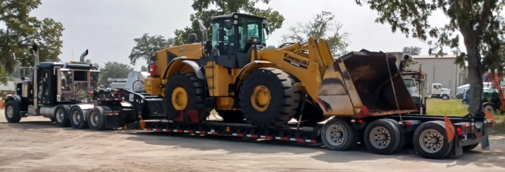 Heavy Equipment Hauling: Safely Moving the Backbone of Industry Across Florida